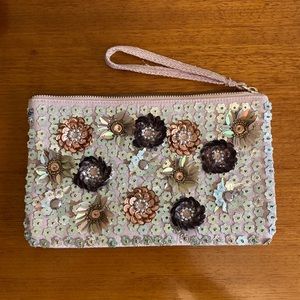 Light pink sequinned wristlet